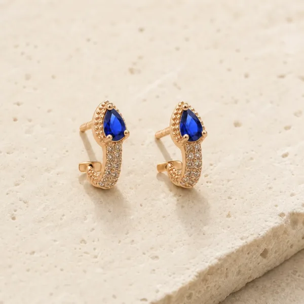 Brincos dourados rosa com cristal gota cristal azul