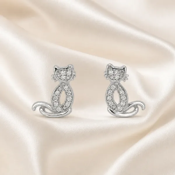 brincos prateados criativos em forma de gato com cristais em cetim marfim, referência 85374-22
