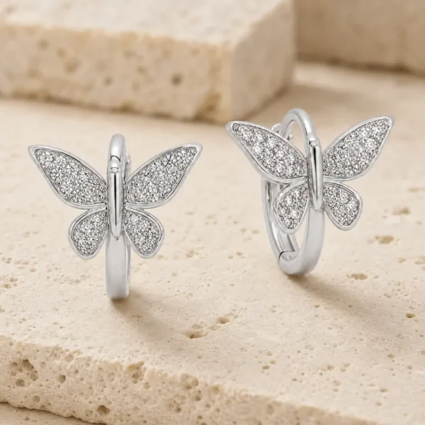 argolas prateadas premium com borboleta pav茅 em pedra clara, refer锚ncia 85376-9