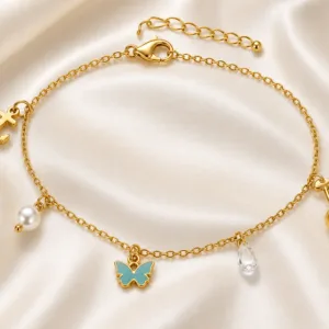 pulseira dourada com pendentes coloridos em cetim marfim, referência 85384-2