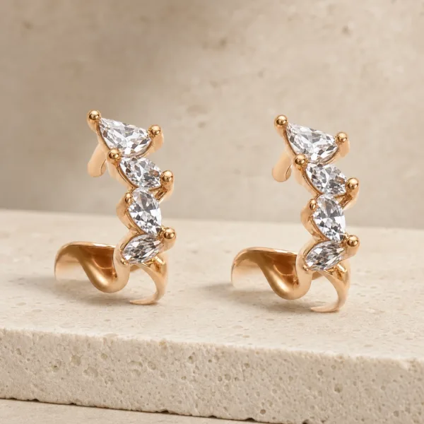 Brincos ear cuff dourados rosa com cristais brancos sobre pedra - Modelo A